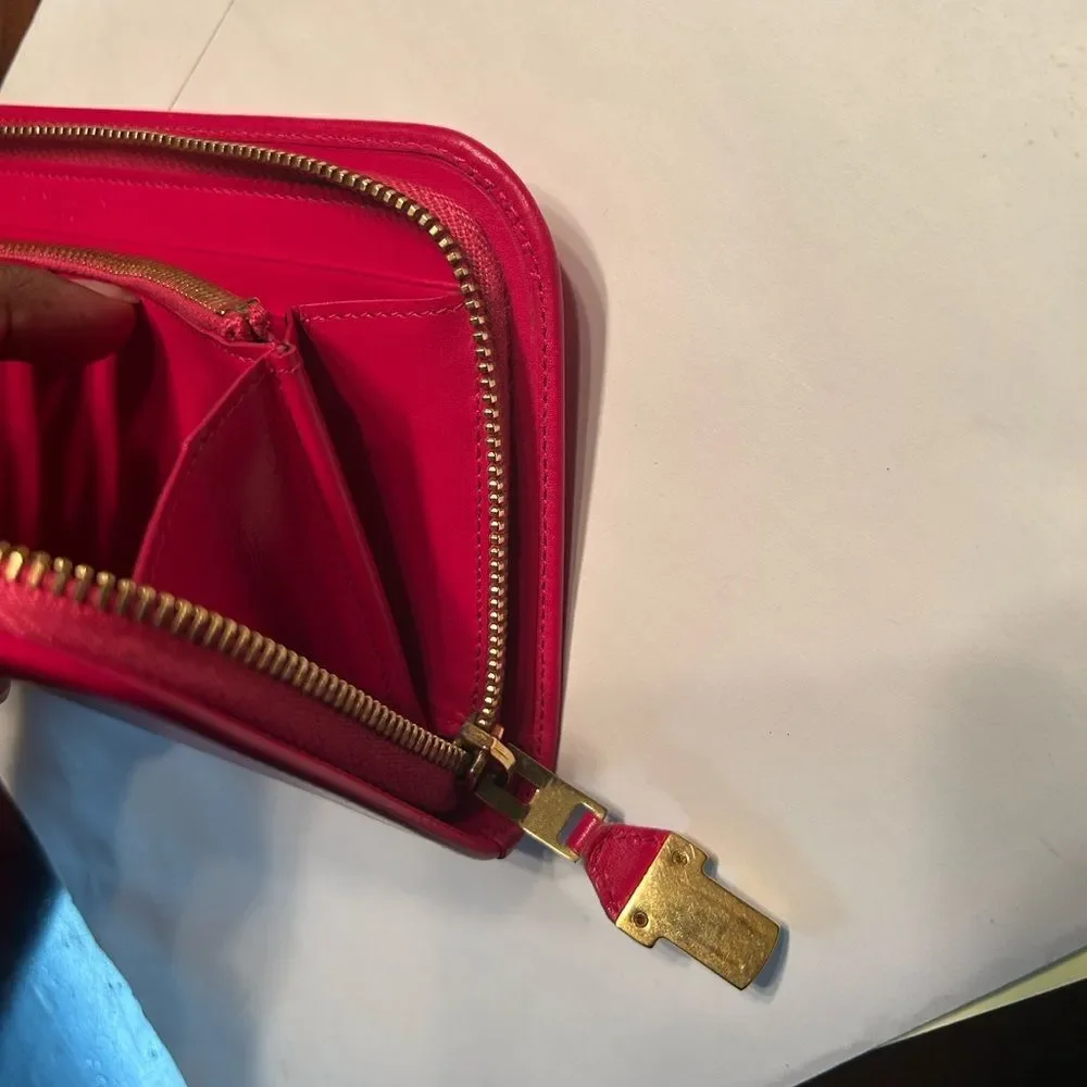 Authentic Saint Laurent Pink Zippy Wallet